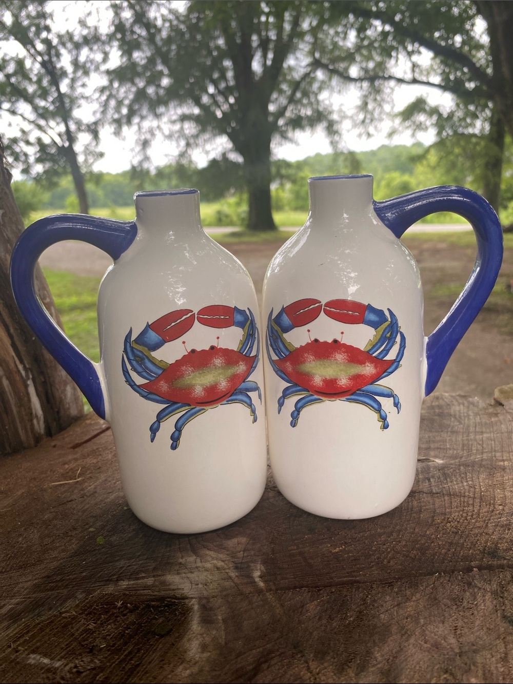 Set of 2 White Ceramic jugs with Blue Handles and Red Crab Motif